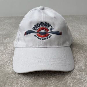 Monterey’s Woody's At The Airport embroidered hat, by acclaimed Chef Tim Woods